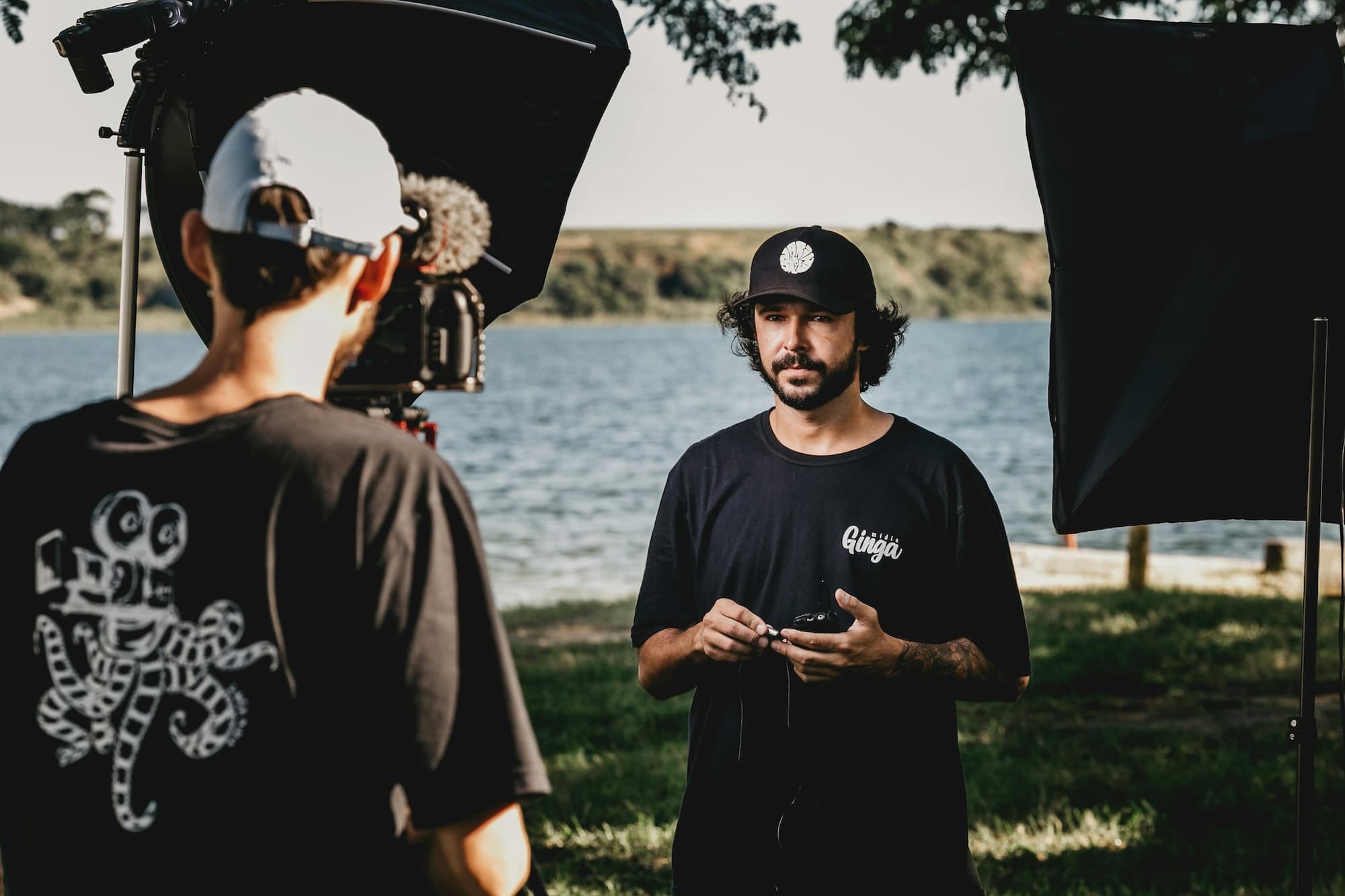 Two men shooting a tutorial video.